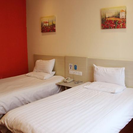 Hanting Express Tianjin Haixin District Yujiapu Тяньцзинь Номер фото